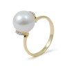 Ring from 14 karat gold with natural pearls