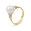 Ring from 14 karat gold with natural pearls and diamonds
