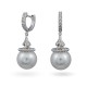 Earrings from 14 karat white gold with sea pearls and diamonds