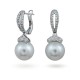 Earrings from 14 karat white gold with sea pearls and diamonds