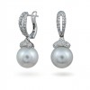 Earrings from 14 karat white gold with sea pearls and diamonds