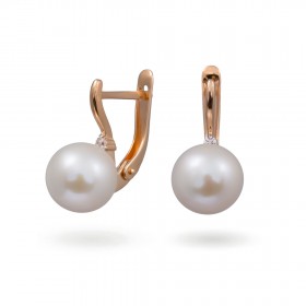 Earrings in 14 karat gold with natural pearls and cubic zirkonia