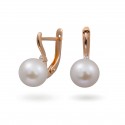 Earrings in 14 karat gold with natural pearls and cubic zirkonia