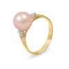Ring from 14 karat gold with natural pearls and diamonds
