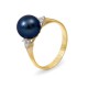 Ring from 14 karat gold with natural pearls and diamonds