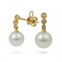 Earrings from 14 karat gold with natural pearls and diamonds