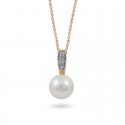 Pendant in 14 karat gold with natural pearls